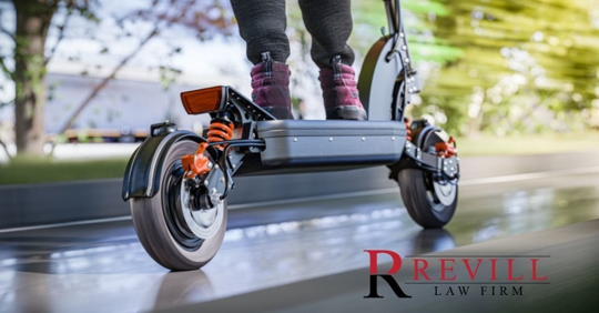 Electric scooter fast ride through the city - closeup to back wheel, motion blur effect