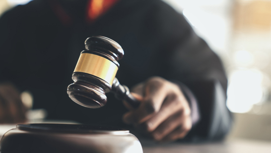 judge making a ruling with a gavel