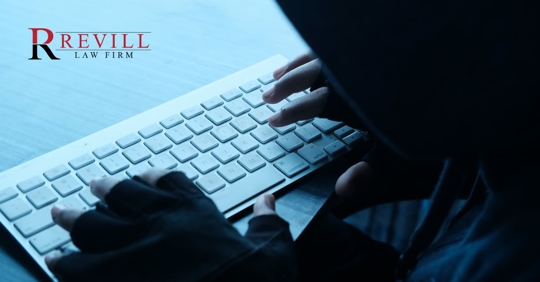 a person typing on a laptop